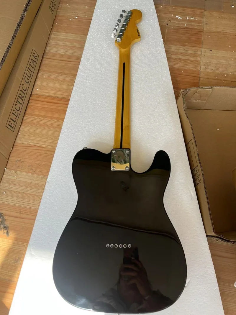 Left-handed 6-string electric guitar，Maple neck，High gloss black body，String through the body，Solid wood quality, free delivery