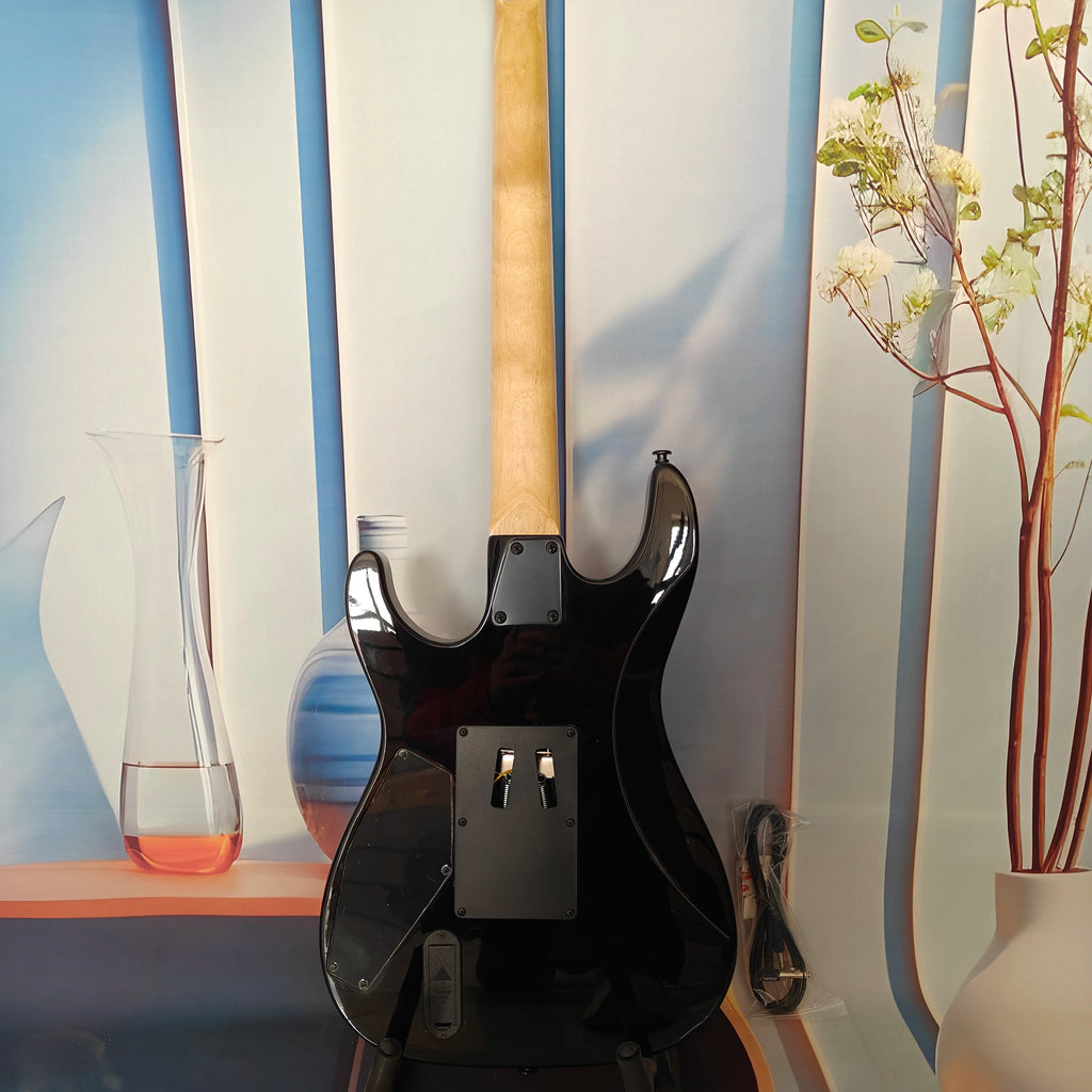 A high-quality acoustic electric guitar with solid wood body, body decals, rock style, right-hand playing and stainless steel fr